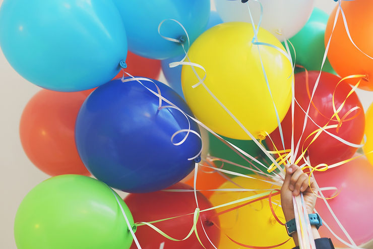 A bundle of different color balloons